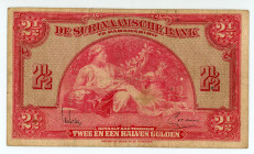 Suriname
Surinaamsche Bank
2 1/2 Gulden, 1st January 1942
S/N 328896
Signatures of G.C.F. Schoch and S.J. Baukema
Printer: ABNC
Pick 87b

Fine.

From ...