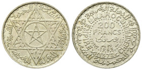 MAROCCO
Mohammed V, 1927-1961.
200 Franchi 1953.
Ag
gr. 7,95
Dr. Stella a cinque punte entro stella a sei punte.
Rv. Valore e data.
KM#Y53.
FD...