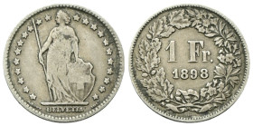 SVIZZERA
Confederazione Elvetica, dal 1848.
Franco 1898 B.
Ag
gr. 4,85
Dr. Elvetia stante verso s., tiene scudo e lancia.
Rv. Valore entro coron...