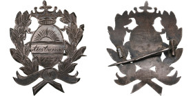 Latvia? Silver Badge 1888
4.99g. 40x33mm. Badge in the form of a wreath surmounted by a crown, with an oval center featuring engraving over a sunburst...