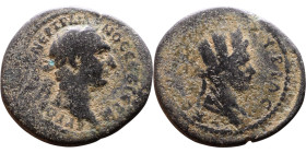 Trajan (98-117) Koinon of Syria, Antioch mint. Bronze coin. Obv: Laureate, draped bust of emperor. Rev: Turreted, veiled and draped bust of Tyche righ...