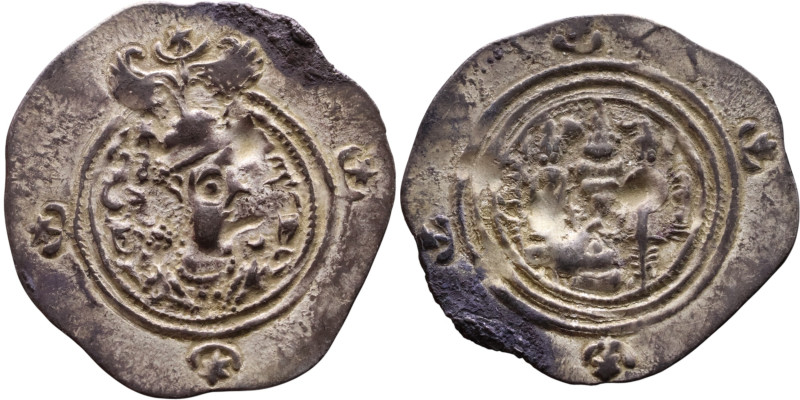 Khosrow II (591-628) Drachm Obv: Bust of a king wearing a winged crown, turned t...