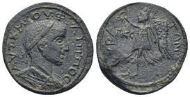 Philip II (247-249). AE. (10.14 Gr. 25mm.)
Laureate, draped and cuirassed bust right; below, globe. 
Rev. Nike advancing left, holding wreath and palm...