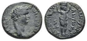 CARIA. Antioch ad Maeandrum. Domitian (81-96). Ae. (3.36 Gr. 15mm.)
 Laureate head right. 
Rev. Liknophoros standing right, supporting basket atop his...