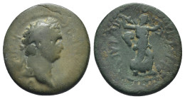 Hadrian AD 119-138. AE (4.50 Gr. 20mm.)
Laureate head to right
Rev. Apollo standing to right, holding bow and arrow with cloak flowing behind.