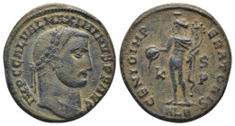 MAXIMINUS II. 309-313 AD. AE. Follis (6.58 Gr. 24mm.). Struck 309-310 AD. Alexandria
Laureate head right 
Rev. Genius standing left, holding patera an...