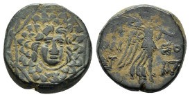 PONTOS.Amisos.(Circa 105-63 BC).Ae.

Obv : Aegis with Gorgon's head at center.

Rev : AΜΙΣΟΥ.
Nike advancing right, holding wreath and palm branch, be...