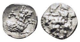 LYCAONIA.Laranda.(Circa 324-323 BC).Obol.
Obv : Baaltars seated left, holding grain ear, bunch of grapes, and scepter.
Rev : Forepart of wolf right;...
