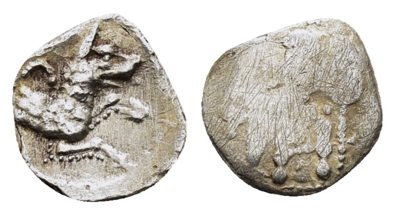 LYCAONIA.Laranda.(Circa 324-323 BC).Obol.
Obv : Baaltars seated left, holding g...