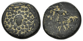 PONTOS.Amisos.(Circa 105-63 BC).Ae.

Obv : Aegis with Gorgon's head at center.

Rev : AΜΙΣΟΥ.
Nike advancing right, holding wreath and palm branch, be...