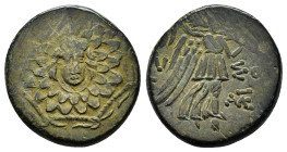 PONTOS.Amisos.(Circa 105-63 BC).Ae.

Obv : Aegis with Gorgon's head at center.

Rev : AΜΙΣΟΥ.
Nike advancing right, holding wreath and palm branch, be...