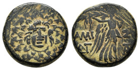PONTOS.Amisos.(Circa 105-63 BC).Ae.

Obv : Aegis with Gorgon's head at center.

Rev : AΜΙΣΟΥ.
Nike advancing right, holding wreath and palm branch, be...