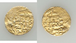 Great Seljuq. Malikshah I pale gold Dinar or Fractional Dinar ND (AH 465-485 / AD 1072-1092) Good XF (flan crack, light scratches), Mint illegible, A-...
