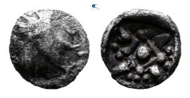 Caria. Uncertain mint circa 400-300 BC. 
Tetartemorion AR

6 mm, 0,18 g



Very Fine