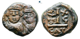Heraclius with Heraclius Constantine AD 610-641. Catania
Decanummium Æ

15 mm, 3,50 g



Nearly Very Fine