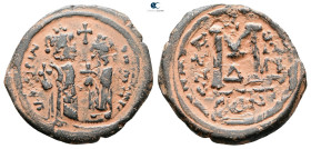 Heraclius with Heraclius Constantine AD 610-641. Constantinople
Follis or 40 Nummi Æ

33 mm, 12,98 g



Very Fine