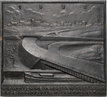 Drittes Reich
 Einseitige Eisengussplakette 1938 (P. Lipp/Hüttenamt Gleiwitz) Neujahrsplakette. Industrielandschaft, im Vordergrund Brücke über ein K...