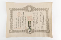Japan, Kriegsmedaille für die Formosa-Strafexpedition 1874, Silber, am Band, dazu Verleihungsurkunde, Urkunde gerollt mit Falten, Zustand 2-3.