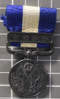 Japan, Kriegsmedaille 1914/15, Bronze geschwärzt, am original Band, Zustand 2.