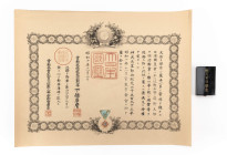 Japan, Orden des heiligen Schatzes 4. Klasse, Silber vergoldet und emailliert, am Band mit Rosette, in lackiertem Etui mit goldener Aufschrift, mit Kn...