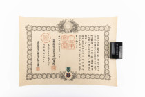 Japan, Orden des goldenen Drachen 4. Klasse, Silber vergoldet und Emaille, am Band mit Rosette, in schwarz lackiertem Verleihungsetui mit silberner Au...