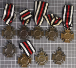 9x Ehrenkreuz für Frontkämpfer mit Schwertern, Eisen bronziert, teilweise am Band oder Bandabschnitt, OEK 3803/1, unterschiedliche Hersteller und Zust...