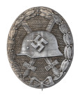 Verwundetenabzeichen in Silber, 2. Form, Zink, massiv, rückseitig "127" für die Firma Moritz Hausch AG Pforzheim, OEK 3845, angelaufen, Zustand 2.