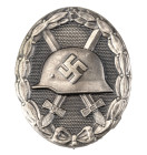 Verwundetenabzeichen in Silber, 2. Form, Tombak versilbert, massiv, rückseitig mit Hersteller "L/21" für die Firma Förster & Barth Pforzheim, OEK 3845...