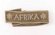 Ärmelband Afrika, khakibraun, silbergraue Kunstseide, sogenannte Kamelhaarausführung, OEK 3880, Länge ca. 34 cm, getragenes Exemplar, Zustand 2-3.
