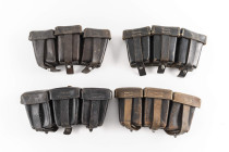 Vier Patronentaschen für den Karabiner 98, schwarzes und braunes Leder, mit Herstellerstempel, unterschiedlicher Zustand.