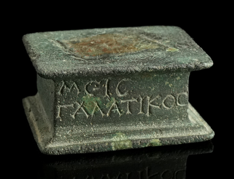 A Roman Bronze Base with Inscription
Circa 1st-3rd century AD.
Rectangular, moul...
