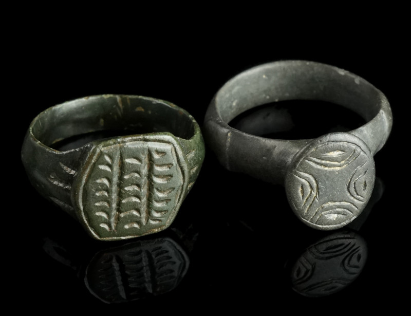 Two Medieval/Early Modern Bronze Rings
Circa 14th-17th century AD.
Both with an ...