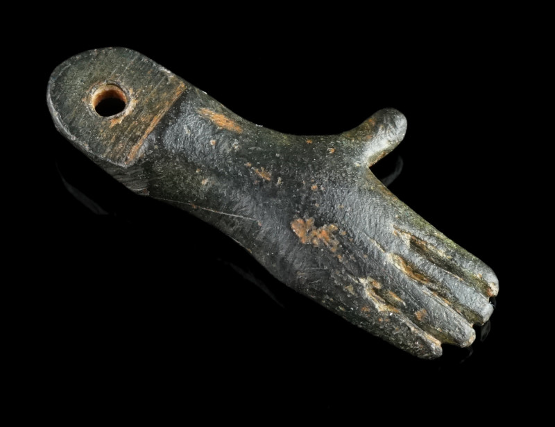 A Fine Roman Bronze Hand Shaped Amulet Pendant
Circa 2nd-3rd century AD.
Well mo...