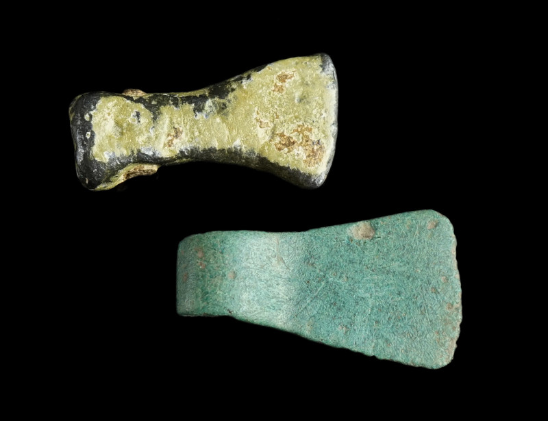 Two Celto-Roman Axe Pendants
Circa 1st century AD.
One made of bronze, with susp...
