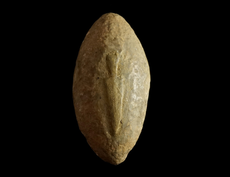 A Greek Decorated Lead Sling Shot
Circa 4th-3rd century BC.
Almond shaped sling ...