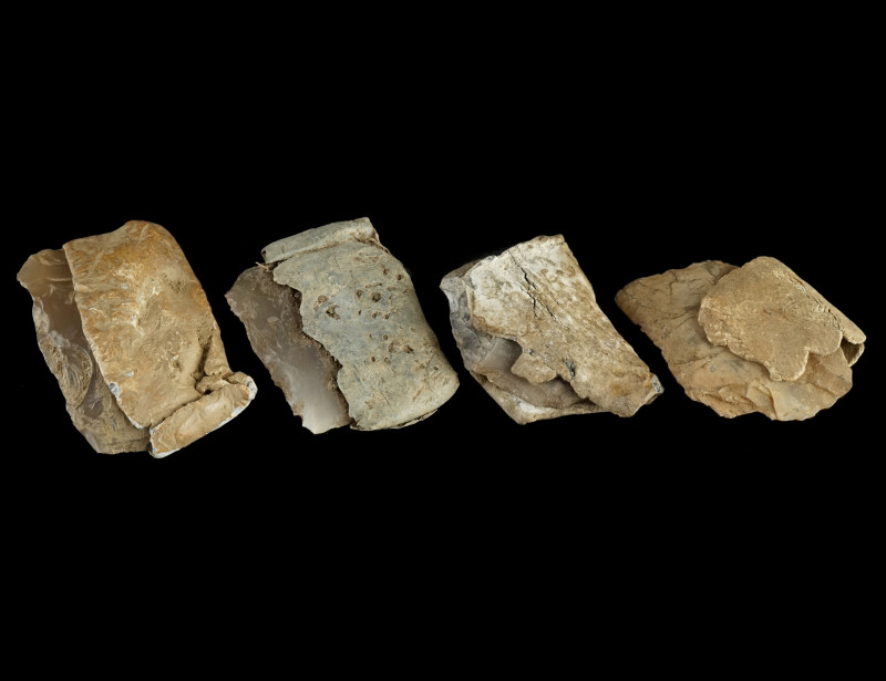Four Lead Coated Flints from Flintlocks
Circa 17th-early 19th century.
Four lead...