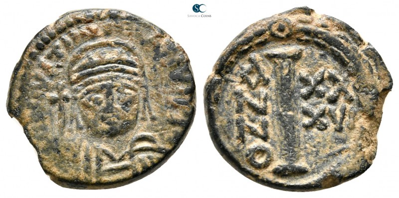 Justinian I AD 527-565. Ravenna
Decanummium Æ

15 mm., 2,77 g.



very fi...
