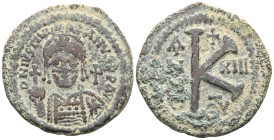 Byzantine Justinian I. 527-565. AE half follis . Antioch mint, dated RY 22 = 548/9. D N IVSTINIANVS P P AVG, helmeted and cuirassed bust of Justinian ...