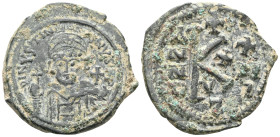 Byzantine Justinian I, 527-565. Half follis , Cyzicus. D N IVSTINIANVS P P AVI Helmeted, diademed and cuirassed bust of Justinian I facing, holding gl...