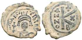Byzantine Maurice Tiberius. (600-601 AD). 1/2 Follis. Constantinople. Obv: bust of Maurice Tiberius facing. Rev: A/N/N/O K. 

 Weight: 5,3 gr Diamet...