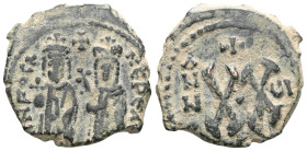 Byzantine Phocas, with Leontia, 602-610. Half Follis , Theoupolis (Antioch), regnal year 3= 604-5. D N FOCAS NE PE VA To left, Phocas, crowned, robed ...