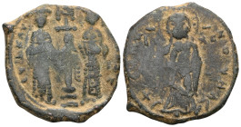 Byzantine Constantine X Ducas, AE, Follis (Bronze) Constantinople. 1059-1067 AD. Obv: + EM[MA] NO[VHA], Christ standing facing on footstool, wearing n...