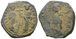Byzantine Constantine X Ducas, AE, Follis (Bronze) Constantinople. 1059-1067 AD. Obv: + EM[MA] NO[VHA], Christ standing facing on footstool, wearing n...