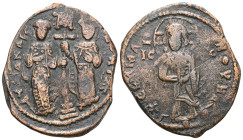 Byzantine Constantine X Ducas, AE, Follis (Bronze) Constantinople. 1059-1067 AD. Obv: + EM[MA] NO[VHA], Christ standing facing on footstool, wearing n...