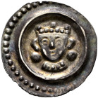 Ulm, königliche Münzstätte. Konrad IV. bis Konradin 1237-1254-1268. 
Brakteat 1265-1270. Gekröntes Brustbild mit seitlichen Haarlocken zwischen zwei ...