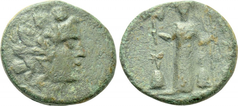 CARIA. Euromos. Ae (1st century BC). 

Obv: Head of Dionysos right, wearing iv...