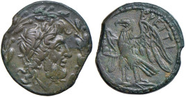 § BRUTTIUM Brettii - AE 22 mm (circa 289-287 a.C.) Testa di Zeus a dx in corona d’alloro - R/ Aquila stante a sx - S.Cop. 1675 AE (g 7,17)

Status: ...