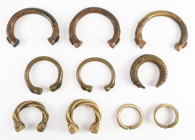 Ethnographics - Africa, lot of Manilla bracelets used as currency in West Africa from the 16th to 20th century, cont. 3x large copper & 2x small coppe...