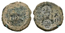 Byzantine Coinage - Heraclius (610-641) - A Byzantine Follis (probably Heraclius, illegible, 13.57g) as a host coin: 2 countermarks on the reverse, a ...