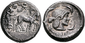 SICILY. Syracuse. Deinomenid Tyranny, 485-466 BC. Tetradrachm (Silver, 24 mm, 16.94 g, 4 h), circa 480-478. Charioteer, holding kentron in his right h...